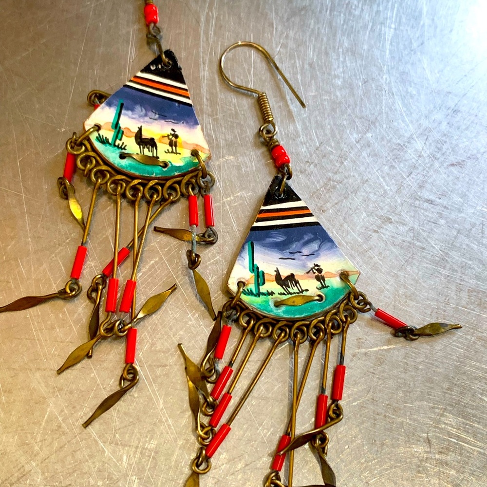 Hand-painted earrings with alpaca scene and brass.